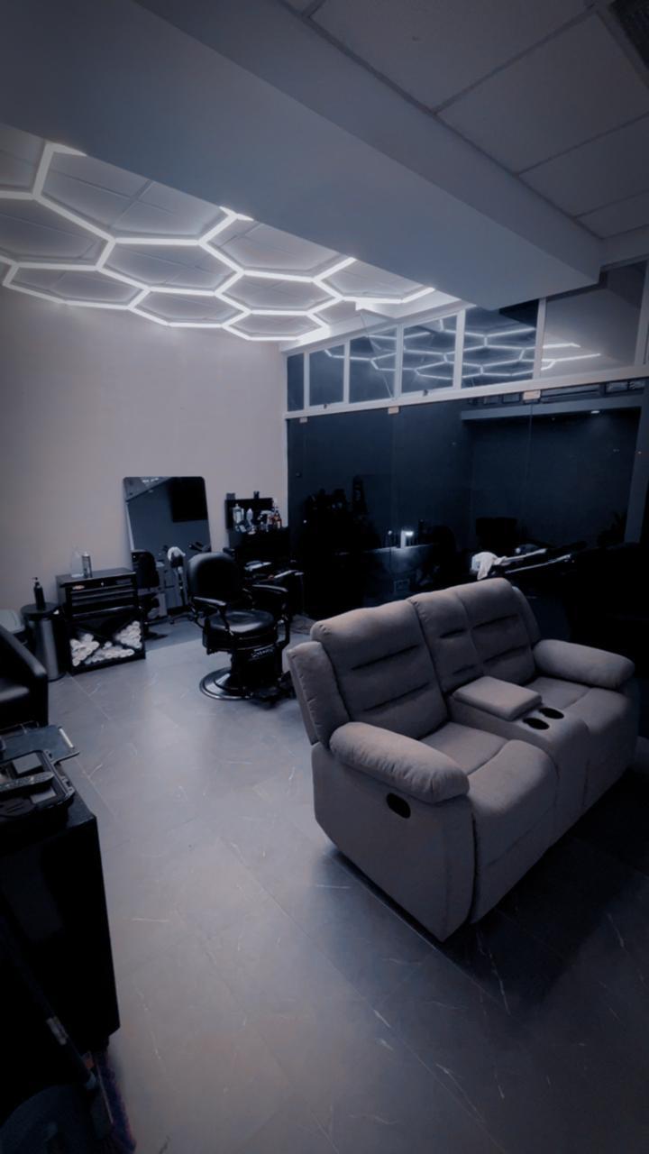 Sala de espera de THE SITE STUDIO BARBER